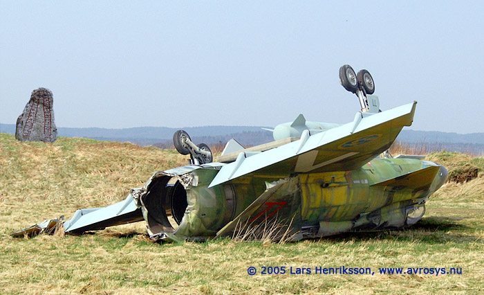 Swedish Attack Aircraft AJ 37 Viggen. Air Force number 37077. Marking from its active time at Wing F7, Stens. Here at the fire and rescue training site at Halmstad